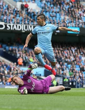 Sergio Aguero of Manchester City scores the first goal past Robert Green of QPR - Barclays Premier League - Manchester City vs QPR - Etihad Stadium - Manchester - England - 10th May 2015 - Picture Simon Bellis Sportimage EDITORIAL USE ONLY. No use with unauthorised audio, video, data, fixture lists, club league logos or live services. Online in-match use limited to 120 images, no video emulation. No use in betting, games or single club league player publications.