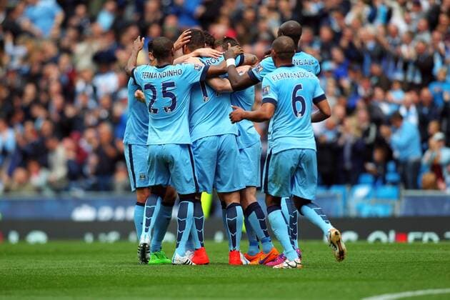 Aktuell FuÃŸball, England, Manchester City - Queens Park Rangers 10.05.2015. Manchester, England. Barclays Premier League. Manchester City versus Queens Park Rangers. Aleksandar Kolarov of Manchester City celebrates scoring his teams second goal (2-0) directly from a free kick xPaulxKeevilx  ActionPlus11619729