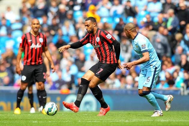 Aktuell FuÃŸball, England, Manchester City - Queens Park Rangers 10.05.2015. Manchester, England. Barclays Premier League. Manchester City versus Queens Park Rangers. Matt Phillips of QPR and Fernando of Manchester City compete for the ball xPaulxKeevilx  ActionPlus11619794