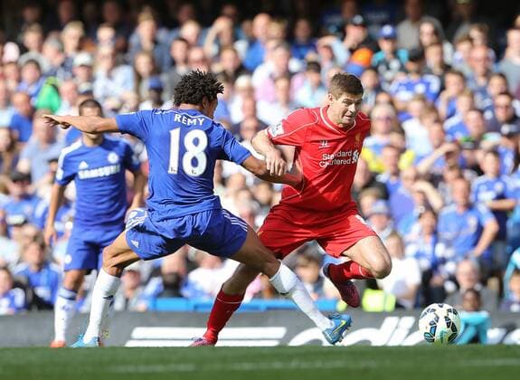 Chelsea s Loic Remy tussles with Liverpool s Steven Gerrard Barclays Premier League - Chelsea vs Liverpool- Stamford Bridge - England - 10th May 2015 - Picture David Klein Sportimage EDITORIAL USE ONLY. No use with unauthorised audio, video, data, fixture lists, club league logos or live services. Online in-match use limited to 120 images, no video emulation. No use in betting, games or single club league player publications.