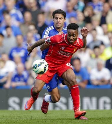 10.05.2015. London, England. Barclays Premier League. Chelsea versus Liverpool. Liverpool& x2019;s Raheem Sterling in a tussle with Chelsea s Cesc Fabregas xCraigxMercerx  ActionPlus11619914