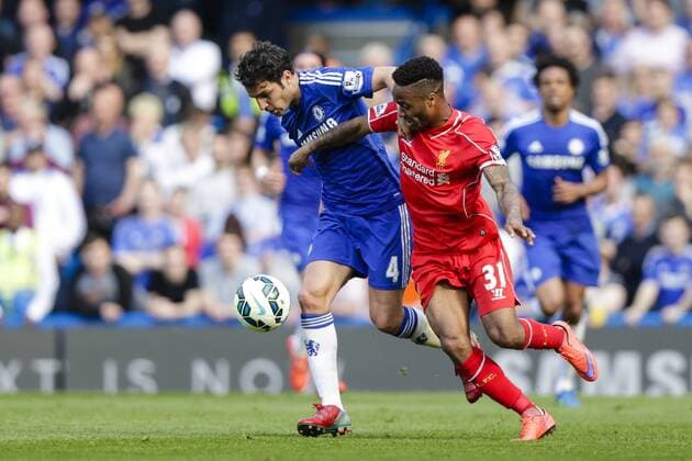 10.05.2015. London, England. Barclays Premier League. Chelsea versus Liverpool. Liverpool& x2019;s Raheem Sterling in a tussle with Chelsea s Cesc Fabregas xCraigxMercerx  ActionPlus11619915