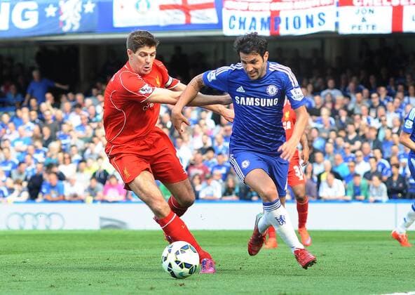 Football - 2014 2015 Premier League - Chelsea vs. Liverpool Cesc Fabregas of Chelsea and Steven Gerrard of Liverpool at Stamford Bridge. COLORSPORT ANDREW COWIE 