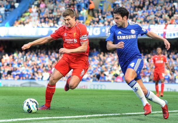Football - 2014 2015 Premier League - Chelsea vs. Liverpool Cesc Fabregas of Chelsea and Steven Gerrard of Liverpool at Stamford Bridge. COLORSPORT ANDREW COWIE 