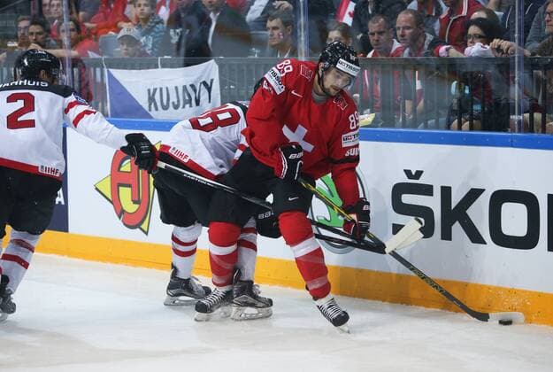 Ice hockey Eishockey - IIHF Ice Hockey WC 2015 PRAGUE,CZECH REPUBLIC,10.MAY.15 - ICE HOCKEY - IIHF World Ice Hockey Championships, international match Länderspiel Switzerland vs Canada. Image shows Dan Hamhuis and Cody Almond (SUI). GEPAxpictures xAndreasxPranter 