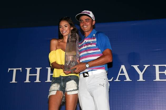 May 10, 2015 - Ponte Vedra Beach, Florida, United States - Alexis Randock (L) and Rickie Fowler hold the trophy after the final round of THE PLAYERS Championship. THE PLAYERS Championship - Final Round - ZUMAw109