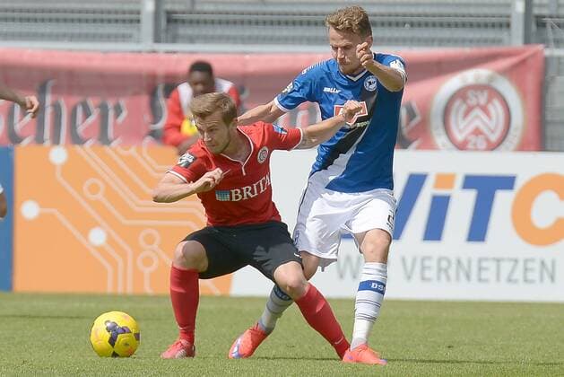 FUSSBALL - 3. LIGA - 09.05.2015, SV WEHEN WIESBADEN vs. DSC ARMINIA BIELEFELD, v.l. Daniel Blacha (SVWW), Sebastian Schuppan (Bielefeld), -