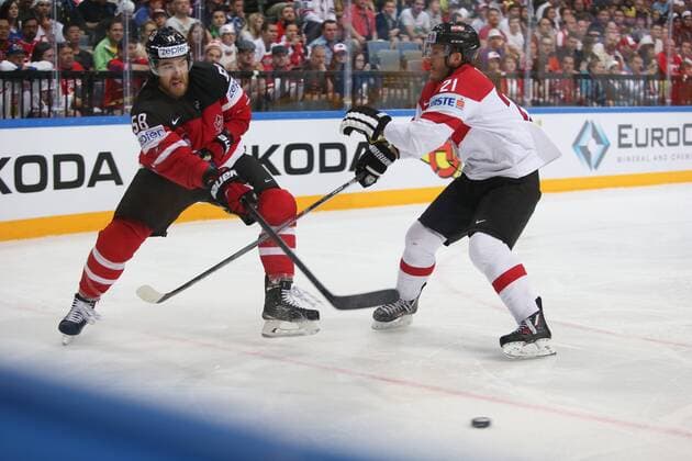 Ice hockey Eishockey - IIHF Ice Hockey WC 2015 PRAGUE,CZECH REPUBLIC,12.MAY.15 - ICE HOCKEY - IIHF World Ice Hockey Championships, international match Länderspiel Canada vs Austria. Image shows David Savard (CAN) and Manuel Geier (AUT). GEPAxpictures xAndreasxPranter 