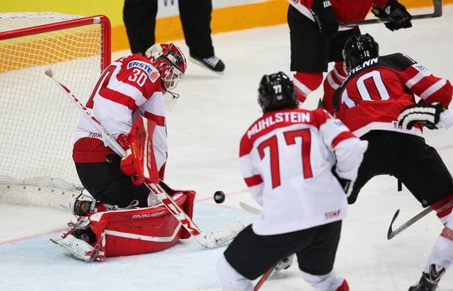 Ice hockey Eishockey - IIHF Ice Hockey WC 2015 PRAGUE,CZECH REPUBLIC,12.MAY.15 - ICE HOCKEY - IIHF World Ice Hockey Championships, international match Länderspiel Canada vs Austria. Image shows Rene Swette, Florian Muehlstein (AUT) and Brayden Schenn (CAN). GEPAxpictures xAndreasxPranter 