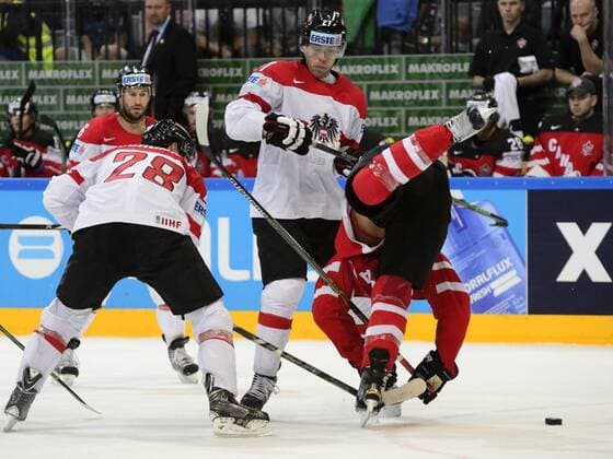 Left to right: Martin Schumnig (AUT), Thomas Hundertpfund (AUT) and Brayden Schenn (CAN) in action during their Hockey World Championships Group A match Canada vs Austria in Prague, Czech Republic, May 12, 2015. (CTKxPhoto MichalxKamaryt) CTKPhotoP201505120568801  kmt 6