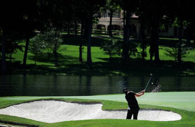May 13, 2015 - Charlotte, NC, USA - Golf - - Phil Mickelson hits his second shot from a sand trap along the 17th green during the Pro-Am on Wednesday, May 13, 2015, at Quail Hollow Club in Charlotte, N.C. Wells Fargo Pro-Am round - ZUMAm67_