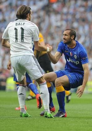 Real Madrid Midfielder, Gareth Frank Bale - BALE, number 11 . Juventus Defender, Giorgio Chiellini - CHIELLINI, number 3. Round semifinal of the CHAMPIONS league Football match between Real Madrid - Juventus at the Santiago Bernabeu estadium Madrid - Spain by May 13 2015. 