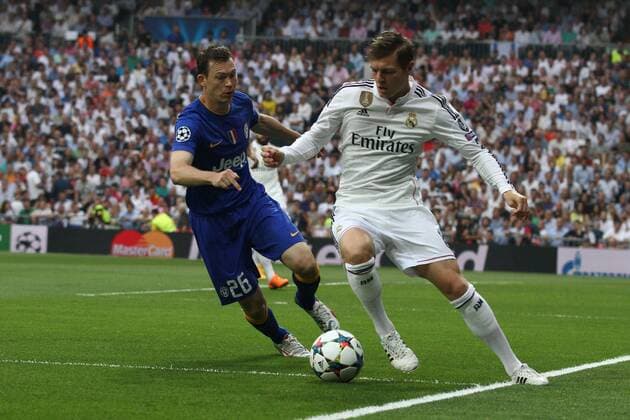 May 13, 2015 - Madrid, Spain - Real Madrid midfielder Toni Kroos (8) vies with Juventus defender Stephan Lichtsteiner (26) during the Uefa Champions League semi finals football match REAL MADRID - JUVENTUS on 13 05 15 at the Estadio Santiago Bernabeu in Madrid, Spain. Copyright 2015 Matteo Bottanelli Real vs Juve  - ZUMAn230
