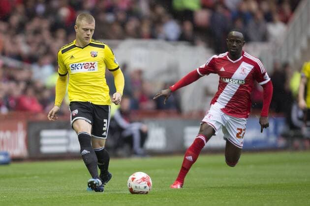 Jake Tidwell of Brentford and Albert Adomah of Middlesbrough - Middlesbrough vs. Brentford - Skybet Championship - Play Off Second Leg - Riverside Stadium - Middlesbrough - 15 05 2015 Pic Philip Oldham Sportimage EDITORIAL USE ONLY. No use with unauthorised audio, video, data, fixture lists, club league logos or live services. Online in-match use limited to 120 images, no video emulation. No use in betting, games or single club league player publications.