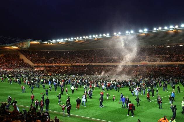 Fans invade the pitch at full time - Middlesbrough vs. Brentford - Skybet Championship - Play Off Second Leg - Riverside Stadium - Middlesbrough - 15 05 2015 Pic Philip Oldham Sportimage EDITORIAL USE ONLY. No use with unauthorised audio, video, data, fixture lists, club league logos or live services. Online in-match use limited to 120 images, no video emulation. No use in betting, games or single club league player publications.