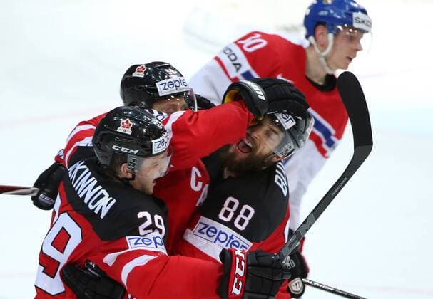 PRAGUE, CZECH REPUBLIC. MAY 16, 2015. Canada s Nathan Mackinnon, Jason Spezza and Brent Burns (L-R) celebrate scoring in the 2015 IIHF World Championship WM Weltmeisterschaft semifinal Ice hockey Eishockey match against Czech Republic at O2 Arena. The Canadian team won the game 2:0. Valery Sharifulin TASS  TS003658
