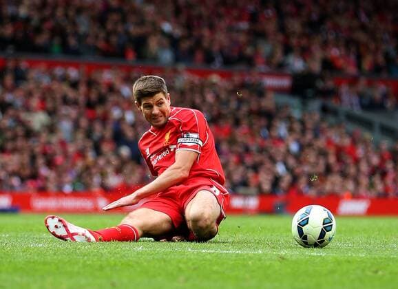 Steven Gerrard of Liverpool slides in to intercept the ball - Barclays Premier League - Liverpool vs Crystal Palace - Anfield Stadium - Liverpool - England - 16th May 2015 - Picture Simon Bellis Sportimage EDITORIAL USE ONLY. No use with unauthorised audio, video, data, fixture lists, club league logos or live services. Online in-match use limited to 120 images, no video emulation. No use in betting, games or single club league player publications.
