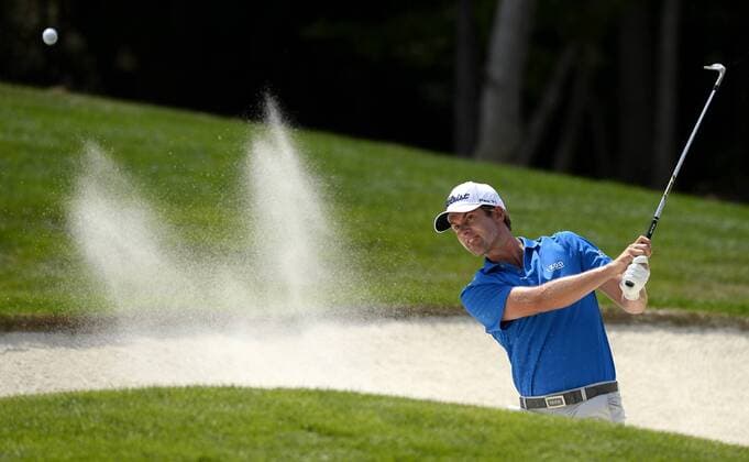 May 16, 2015 - Charlotte, NC, USA - Webb Simpson chips his ball out of a sand bunker near the eighth green during the third round of the Wells Fargo Championship on Saturday, May 16, 2015, at Quail Hollow Club in Charlotte, N.C. Wells Fargo Championship - ZUMAm67_