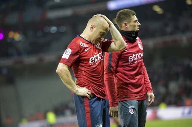 Aktuell Fußball, Frankreich, Ligue 1, OSC Lille - Olympique Marseille deception des joueurs Lillois en fin de match Florent BALMONT (lille) FOOTBALL : Lille vs OM - Ligue 1 - 16 05 2015 JBAutissier Panoramic 