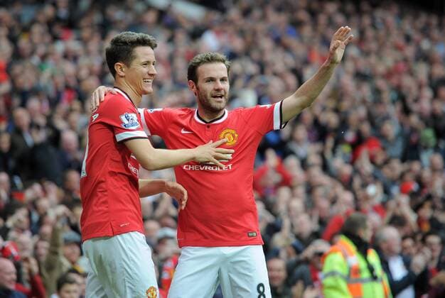 Football - 2014 2015 Premier League - Manchester United ManU vs. Arsenal Ander Herrera of Manchester United celebrates scoring the first goal of the game with Juan Mata at Old Trafford, Manchester 
