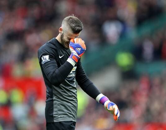 Manchester United ManU s David De Gea looks on dejected after a missed chance Barclays Premier League - Manchester United vs Arsenal - Old Trafford - England - 17th May 2015 - Picture David Klein Sportimage EDITORIAL USE ONLY. No use with unauthorised audio, video, data, fixture lists, club league logos or live services. Online in-match use limited to 120 images, no video emulation. No use in betting, games or single club league player publications.