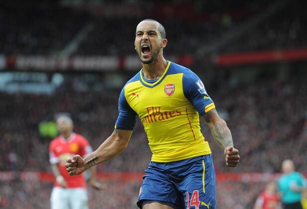 Football - 2014 2015 Premier League - Manchester United ManU vs. Arsenal Arsenal s Theo Walcott celebrates scoring their equalising goal at Old Trafford, Manchester 