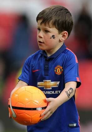 Wayne Rooney s son Kai plays football with a Cristiano Ronaldo tattoo on his arm Barclays Premier League - Manchester United ManU vs Arsenal - Old Trafford - England - 17th May 2015 - Picture David Klein Sportimage EDITORIAL USE ONLY. No use with unauthorised audio, video, data, fixture lists, club league logos or live services. Online in-match use limited to 120 images, no video emulation. No use in betting, games or single club league player publications.