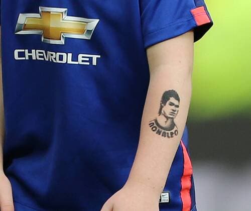 Kai Rooney with a Cristiano Ronaldo tattoo Barclays Premier League - Manchester United ManU vs Arsenal - Old Trafford - England - 17th May 2015 - Picture David Klein Sportimage EDITORIAL USE ONLY. No use with unauthorised audio, video, data, fixture lists, club league logos or live services. Online in-match use limited to 120 images, no video emulation. No use in betting, games or single club league player publications.