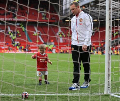 Manchester United ManU s Wayne Rooney with his son Klay Barclays Premier League - Manchester United vs Arsenal - Old Trafford - England - 17th May 2015 - Picture David Klein Sportimage EDITORIAL USE ONLY. No use with unauthorised audio, video, data, fixture lists, club league logos or live services. Online in-match use limited to 120 images, no video emulation. No use in betting, games or single club league player publications.