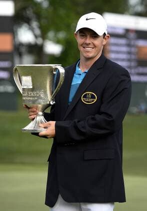 May 17, 2015 - Charlotte, NC, USA - Rory McIlroy with the Wells Fargo Championship trophy after winning the tournament on Sunday, May 17, 2015, at Quail Hollow Club in Charlotte, N.C. Wells Fargo Championship, final round - ZUMAm67_