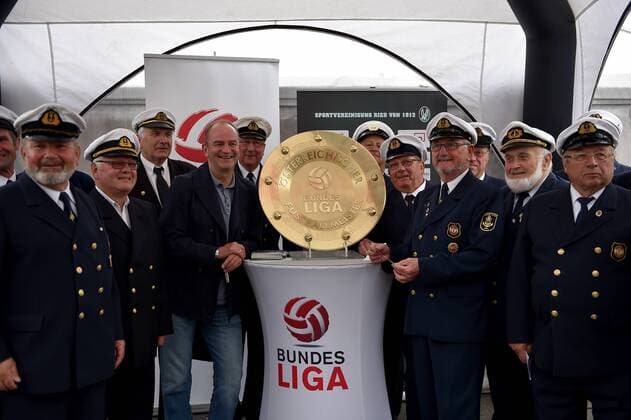 SOCCER - BL, Ried vs Altach RIED,AUSTRIA,19.MAY.15 - SOCCER - tipico Bundesliga, SV Ried vs SCR Altach. Image shows marine chorus Prinz Eugen and Herbert Prohaska with the Meisterteller. Keywords: Meisterteller on Tour. GEPAxpictures xFlorianxErtl