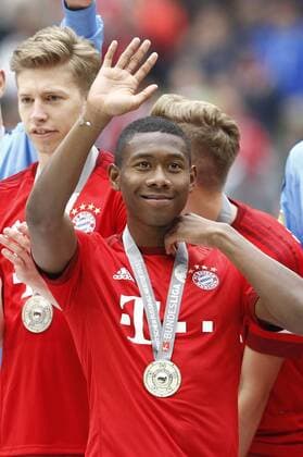 SOCCER - 1. DFL, Bayern vs Mainz MUNICH,GERMANY,23.MAY.15 - SOCCER - 1. DFL, 1. Deutsche Bundesliga, FC Bayern Muenchen vs 1. FSV Mainz 05. Image shows David Alaba (Bayern). Keywords: medal. GEPA xFelixxRoittner