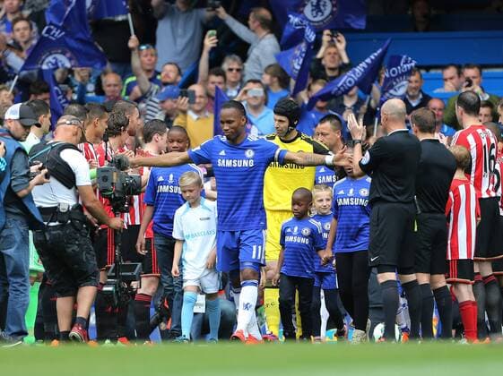 Chelsea s Didier Drogba leads his team out as captain for his final game Barclays Premier League - Chelsea vs Sunderland - Stamford Bridge - England - 24th May 2015 - Picture David Klein Sportimage EDITORIAL USE ONLY. No use with unauthorised audio, video, data, fixture lists, club league logos or live services. Online in-match use limited to 120 images, no video emulation. No use in betting, games or single club league player publications.