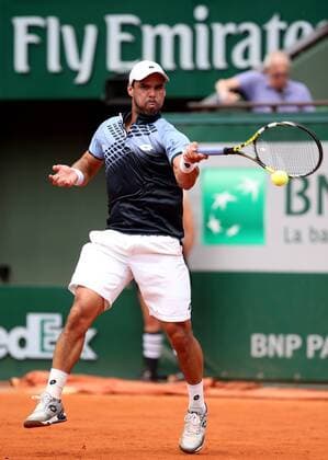 (1505024) -- PARIS, May 24, 2015 -- Alejandro Falla of Colombia competes during the men s singles first round match against Roger Federer of Switzerland at Roland Garros, Paris, France on May 24, 2015. Roger Federer won 3-0 and advanced to the second round. ) (SP)FRANCE-PARIS-TENNIS-ROLAND GARROS-FIRST ROUND HanxYan 