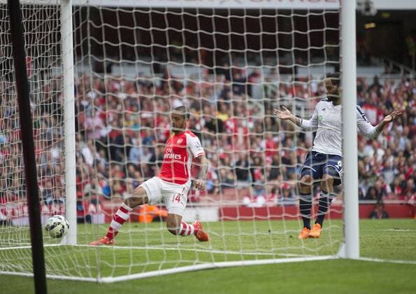 24.05.2015. London, England. Barclays Premier League. Arsenal versus West Bromwich Albion. Arsenal s Theo Walcott scores his third goal of the game to make it 4-0. xNigelxCookex  ActionPlus11623662