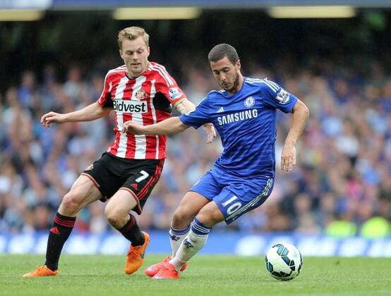 Chelsea s Eden Hazard tussles with Sunderland s Sebastian Larsson Barclays Premier League - Chelsea vs Sunderland - Stamford Bridge - England - 24th May 2015 - Picture David Klein Sportimage EDITORIAL USE ONLY. No use with unauthorised audio, video, data, fixture lists, club league logos or live services. Online in-match use limited to 120 images, no video emulation. No use in betting, games or single club league player publications.