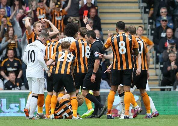 Mauroane Fellaini of Manchester United ManU is red carded for his challenge on Paul McShane of Hull City - Barclays Premier League - Hull City vs Manchester Utd - KC Stadium - Hull - England - 24th May 2015 - Picture Simon Bellis Sportimage EDITORIAL USE ONLY. No use with unauthorised audio, video, data, fixture lists, club league logos or live services. Online in-match use limited to 120 images, no video emulation. No use in betting, games or single club league player publications.