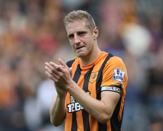 Michael Dawson of Hull City dejected after being relegated - Barclays Premier League - Hull City vs Manchester Utd - KC Stadium - Hull - England - 24th May 2015 - Picture Simon Bellis Sportimage EDITORIAL USE ONLY. No use with unauthorised audio, video, data, fixture lists, club league logos or live services. Online in-match use limited to 120 images, no video emulation. No use in betting, games or single club league player publications.