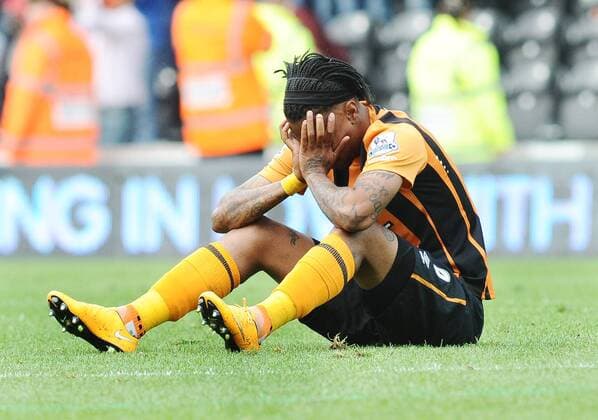 Football - 2014 2015 Premier League - Hull City vs. Manchester United ManU Abel Hernandez of Hull breaks down in tears at the final whistle after being relegated at KC Stadium. COLOSPORT ANDREW COWIE 