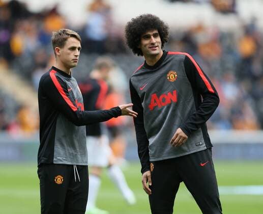 Adnan Januzaj of Manchester United ManU warms up with Mauroane Fellaini of Manchester United - Barclays Premier League - Hull City vs Manchester Utd - KC Stadium - Hull - England - 24th May 2015 - Picture Simon Bellis Sportimage EDITORIAL USE ONLY. No use with unauthorised audio, video, data, fixture lists, club league logos or live services. Online in-match use limited to 120 images, no video emulation. No use in betting, games or single club league player publications.