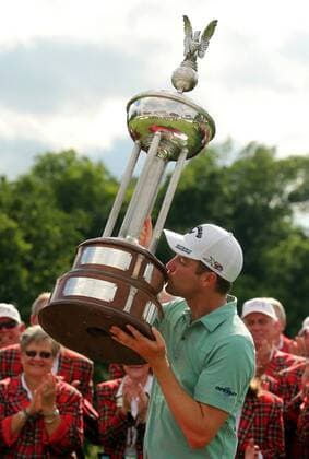 May 24, 2015 - Fort Worth, TX, USA - Chris Kirk, winner of the Crowne Plaza Invitational at Colonial, kisses the Leonard Trophy at the awards presentation at the Crowne Plaza Invitational at Colonial on Sunday, May 24, 2015, in Fort Worth, Texas. Crowne Plaza Invitational at Colonial - ZUMAm67_
