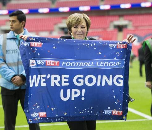 25.05.2015. London, England. Skybet Championship Playoff Final. Middlesborough versus Norwich. Delia Smith with a flag saying We re Going Up after her sides victory as they get promoted to the Premiership. xNigelxCookex  ActionPlus11624257