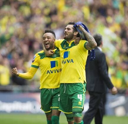 25.05.2015. London, England. Skybet Championship Playoff Final. Middlesborough versus Norwich. Norwich City s Nathan Redmond and Bradley Johnson celebrate at the final whistle as they get promoted to the Premiership. xNigelxCookex  ActionPlus11624259