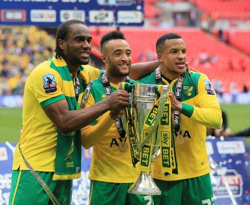 Norwich s Cameron Jerome, Nathan Redmond and Martin Olsson celebrate with the trophy Sky Bet Championship Playoff Final - Middlesbrough vs Norwich City - Wembley Stadium - England - 25th May 2015 - Picture David Klein Sportimage EDITORIAL USE ONLY. No use with unauthorised audio, video, data, fixture lists, club league logos or live services. Online in-match use limited to 120 images, no video emulation. No use in betting, games or single club league player publications.