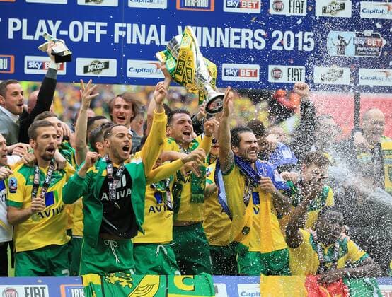 Norwich s Russell Martin celebrates with the trophy Sky Bet Championship Playoff Final - Middlesbrough vs Norwich City - Wembley Stadium - England - 25th May 2015 - Picture David Klein Sportimage EDITORIAL USE ONLY. No use with unauthorised audio, video, data, fixture lists, club league logos or live services. Online in-match use limited to 120 images, no video emulation. No use in betting, games or single club league player publications.