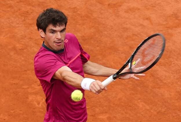 - PARIS, FRANCE: Belgian Germain Gigounon pictured in action during the first round game of the men s singles tournament at the Roland Garros tennis tournament, between Belgian Germain Gigounon and French Richard Gasquet, in Paris, France, Tuesday 26 May 2015. Roland Garros Grand Slam takes place from 24 May to 07 June 2015. VIRGINIExLEFOUR  x04630885x