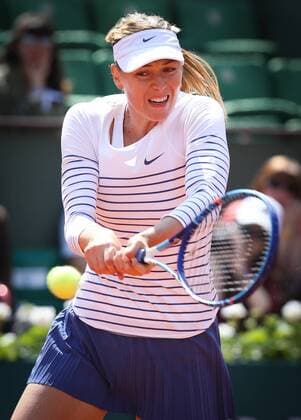 - PARIS, FRANCE: Russian Maria Sharapova pictured in action during a tennis match between Russian Maria Sharapova and Russian Vitalia Diatchenko in round 2 of the women s singles at the Roland Garros tennis tournament, in Paris, France, Wednesday 27 May 2015. Roland Garros Grand Slam takes place from 24 May to 07 June 2015. VIRGINIExLEFOUR  x04631404x