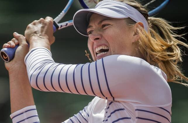 (150527) -- PARIS, May 27, 2015 -- Maria Sharapova of Russia competes during the women s singles second round match against her compatriot Vitalia Diatchenko at 2015 French Open tennis tournament at Roland Garros, in Paris, France on May 27, 2015. Sharapova won 2-0. ) (SP) FRANCE-PARIS-TENNIS-FRENCH OPEN-DAY 4 ChenxXiaowei 