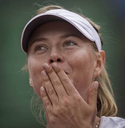 (150527) -- PARIS, May 27, 2015 -- Maria Sharapova of Russia blows a kiss to the crowd after winning the women s singles second round match against her compatriot Vitalia Diatchenko at 2015 French Open tennis tournament at Roland Garros, in Paris, France on May 27, 2015. Sharapova won 2-0. ) (SP) FRANCE-PARIS-TENNIS-FRENCH OPEN-DAY 4 ChenxXiaowei 