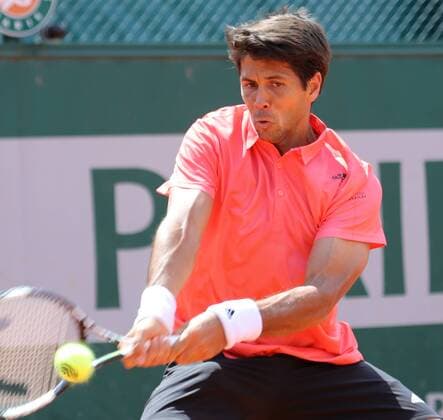 Fernando Verdasco of Spain hits a shot during his French Open men s second round match against Benjamin Becker of Germany at Roland Garros in Paris on May 27, 2015. Becker defeated Verdasco 6-4, 0-6, 1-6, 7-5, 10-8 to advance to the next round.  PAR20150527751 DAVIDxSILPA
